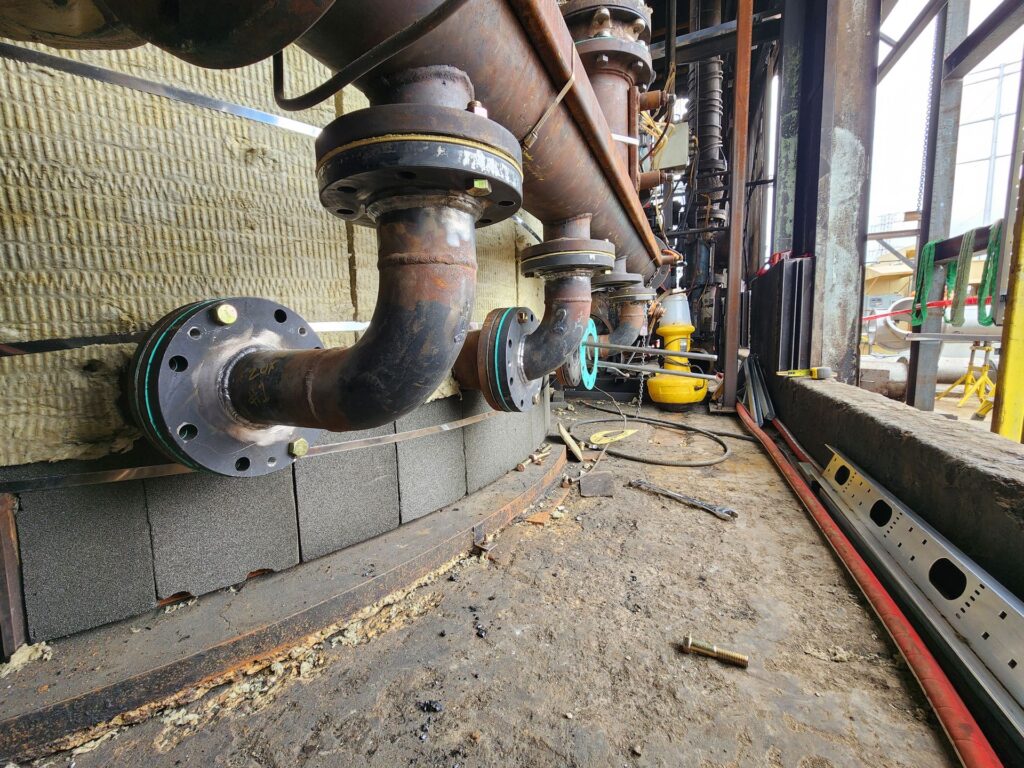 Welded flanged pipe connections on an industrial line