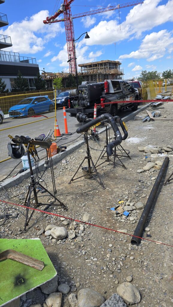 Mobile pipe welding setup at a Calgary construction site