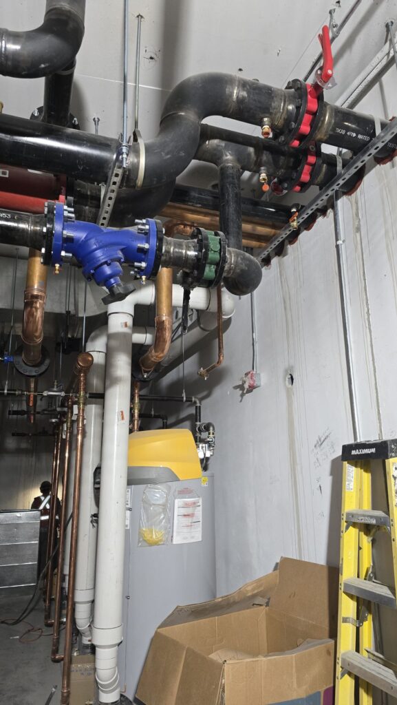 Finished welded piping in a Calgary mechanical room